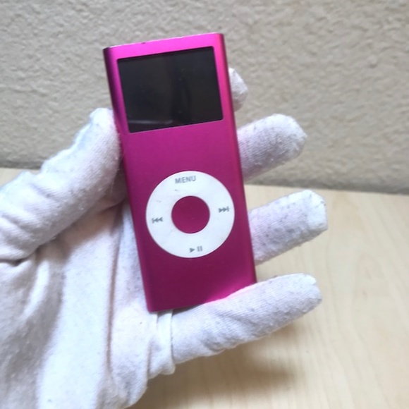 Apple Other - Apple Ipod in Pink. 4GB. 30 pin cable. headphone plug-in. Works Great.